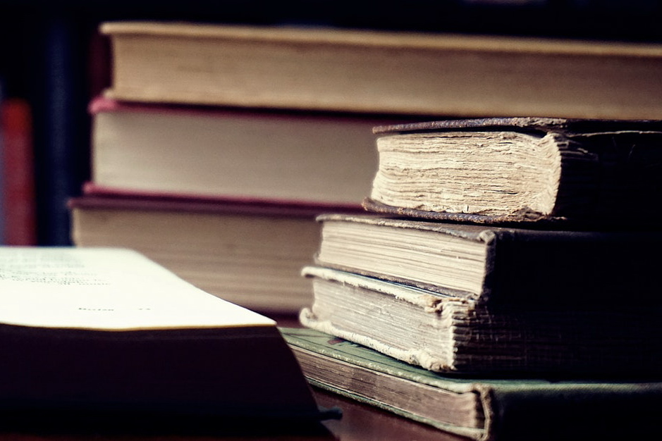 Pile of books on table